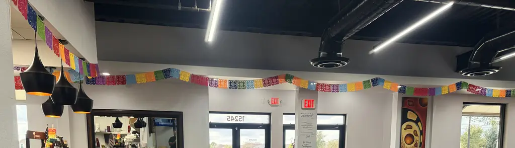 Papel picado strung across the ceiling